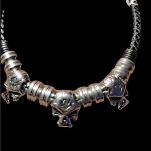 Handmade stainless steel and leather skull necklace